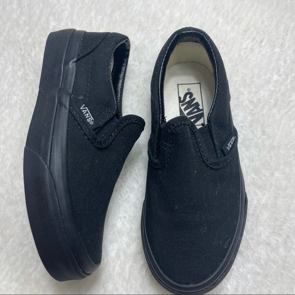 Vans kids slip on black sneakers size 11.5